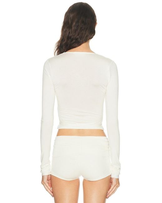 ÉTERNE White Wrap Top