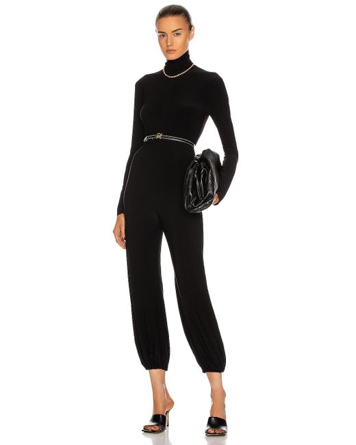 Norma Kamali Turtleneck Jog Jumpsuit in 