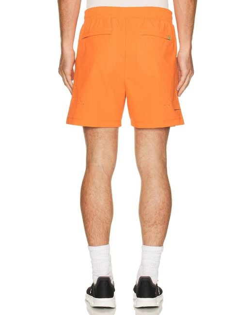 Malbon Orange Performance Poly Tech Short for men