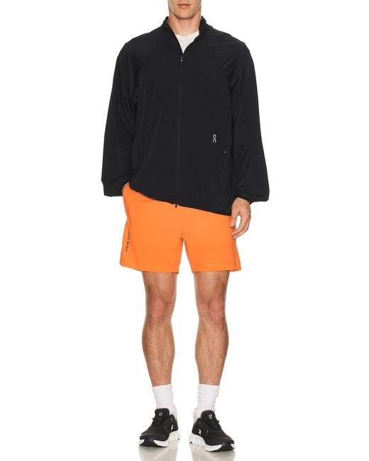Malbon Orange Performance Poly Tech Short for men