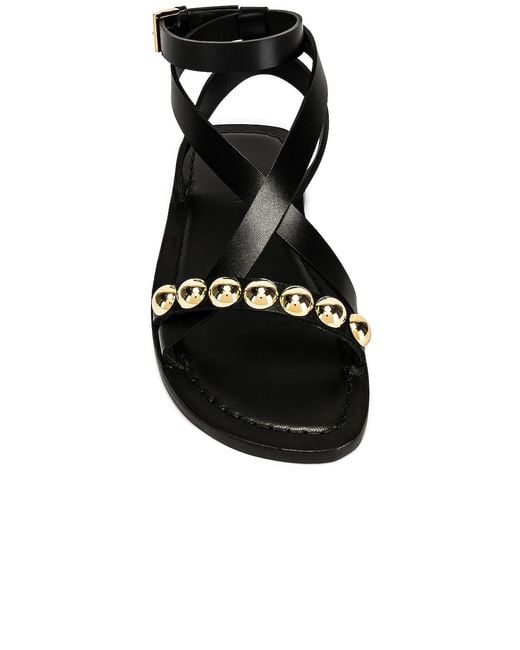 Alaïa Black Flat Ankle Strap Sandals