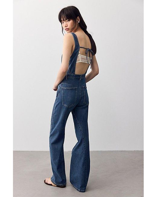 Free People Blue Corsica Twisted Seam Jumpsuit