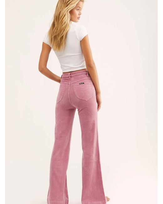 Free People Rolla's East Coast Cord Flare Pants in Pink