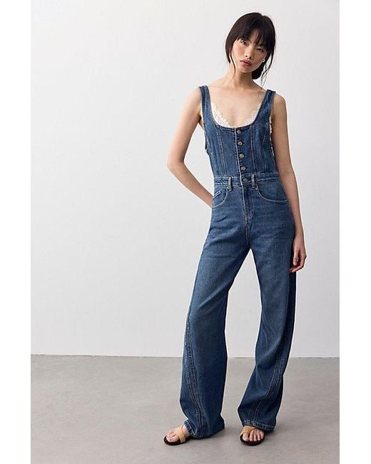 Free People Blue Corsica Twisted Seam Jumpsuit