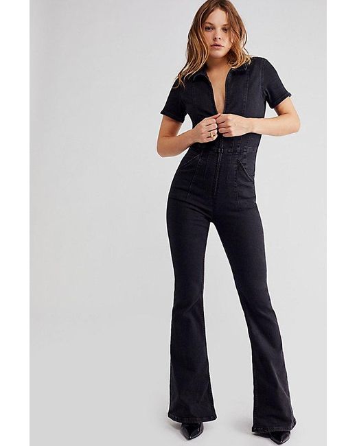 Free People Blue Jayde Flare Jumpsuit At Free People In Black Mamba, Size: Xs