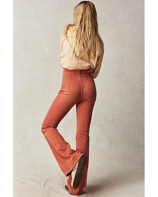 Free People Orange Jayde Flare Jeans At Free People In Apricot Brandy, Size: 25
