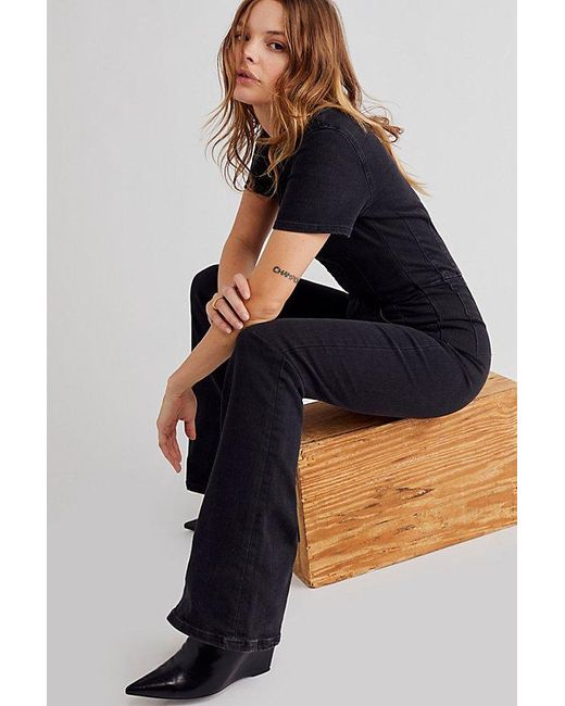 Free People Blue Jayde Flare Jumpsuit At Free People In Black Mamba, Size: Xs