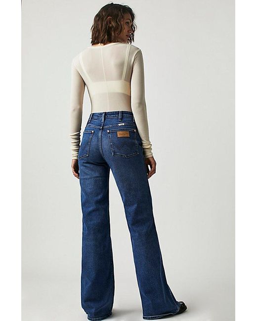 Wrangler Blue Wanderer High Rise Flare Jeans At Free People In Smoke Sea, Size: 25