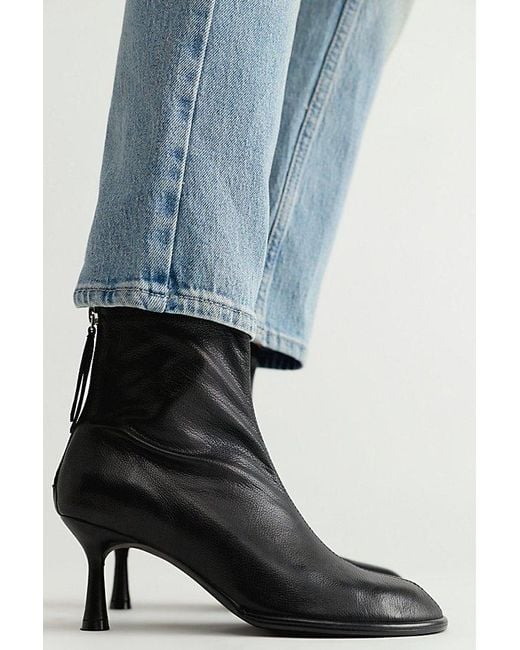 INTENTIONALLY ______ Blue Powerhouse Heeled Boots Shoe By