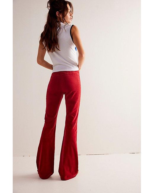 Free People Red Jayde Cord Flare Jeans At Free People In Garnet, Size: 25