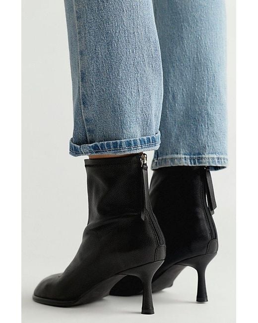 INTENTIONALLY ______ Blue Powerhouse Heeled Boots Shoe By