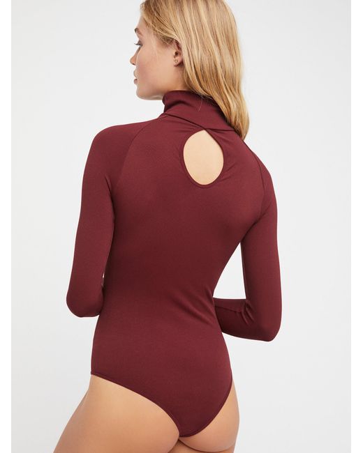 red turtleneck bodysuit