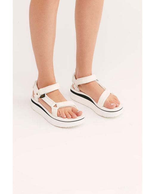 white teva flatform sandals