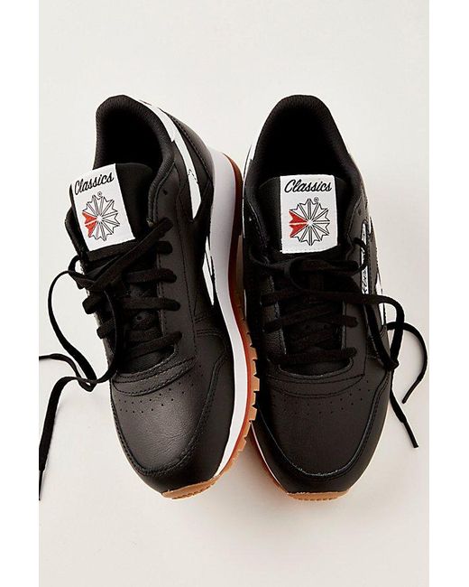 reebok classic leather sneakers in black leather