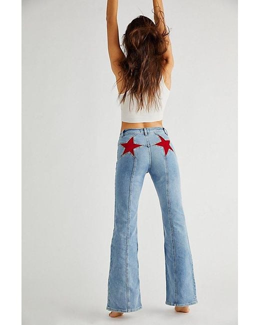 Free People White Firecracker Flare Jeans At Free People In Mid Stone Wash, Size: 24