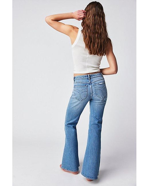 Rolla's East Coast Low-rise Flare Jeans At Free People In Organic Mid Blue, Size: 29