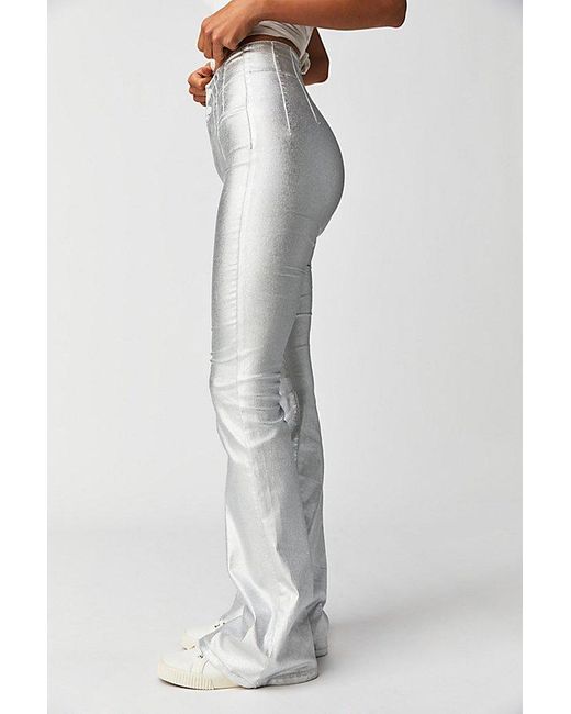 Free People Gray Jayde Metallic Flare Jeans At Free People In Disco Ball Silver, Size: 24
