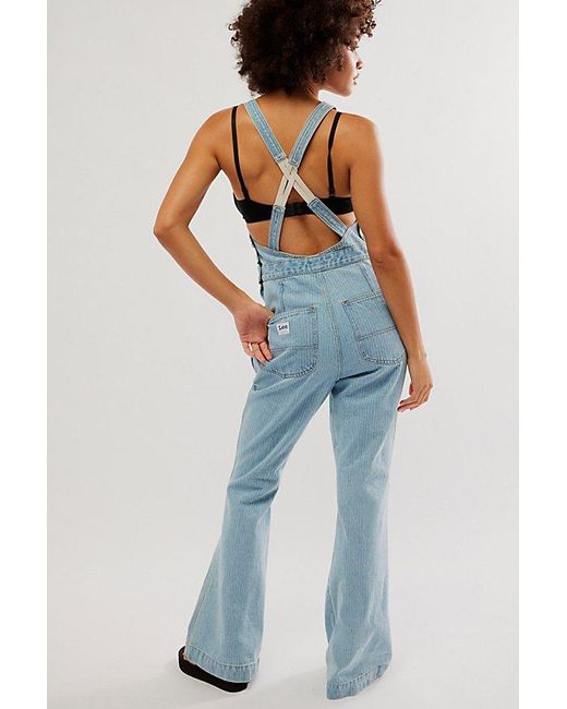 Lee Jeans Factory Flare Overalls At Free People In Vibrant Blues, Size: Xs