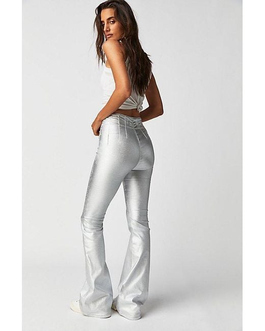 Free People Gray Jayde Metallic Flare Jeans At Free People In Disco Ball Silver, Size: 24