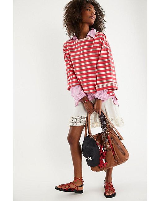 INTENTIONALLY ______ Red Bungee Strappy Sandals By