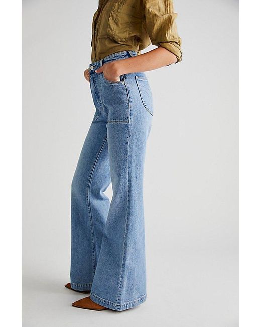 Rolla's East Coast Flare Jeans At Free People In Organic Mid Blue, Size: 31