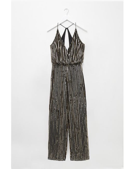 black and gold striped jumpsuit