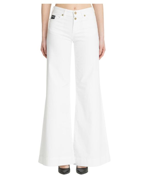 Jeans v-emblem di Versace in White