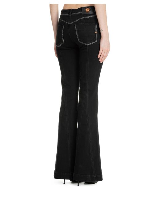 Jeans v-emblem di Versace in Black