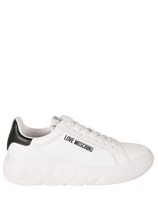 Sneakers di Love Moschino in White