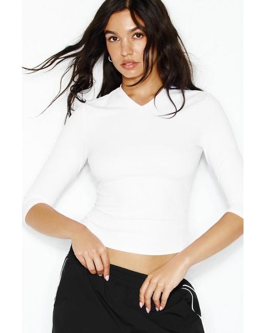 Garage White Sleek High V-Neck 3/4 Sleeve Top