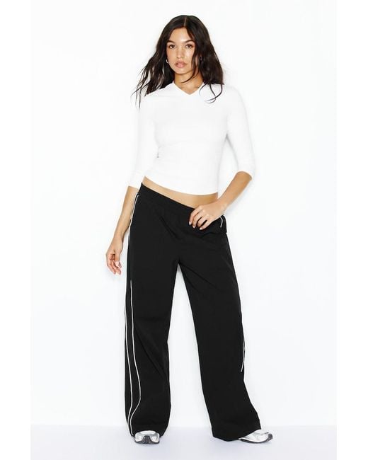 Garage White Sleek High V-Neck 3/4 Sleeve Top
