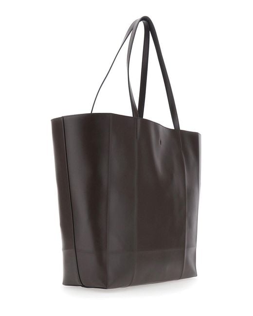 Totême Black 'Roam' Shopper With Double Handles And Embossed Logo