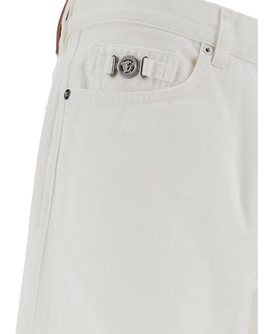 Jeans A Cinque Tasche Con Patch Logo di Versace in White da Uomo