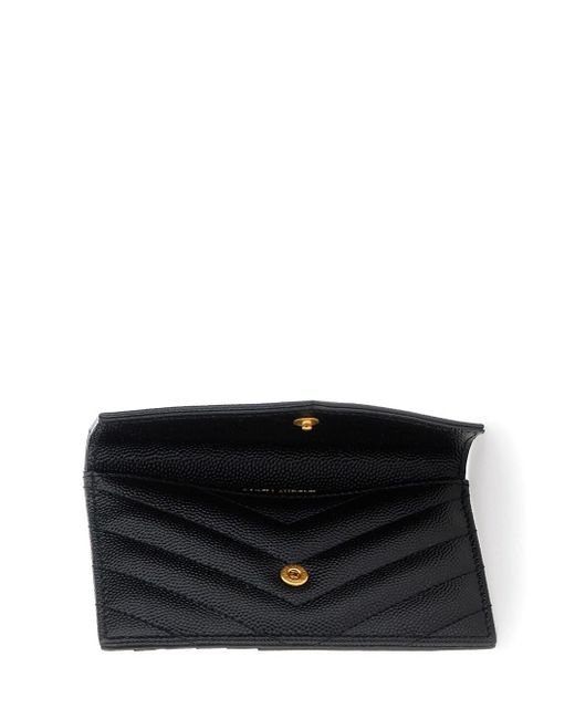 Portacarte 'cassandre' con patta e zip in pelle goffrata donna di Saint Laurent in Black