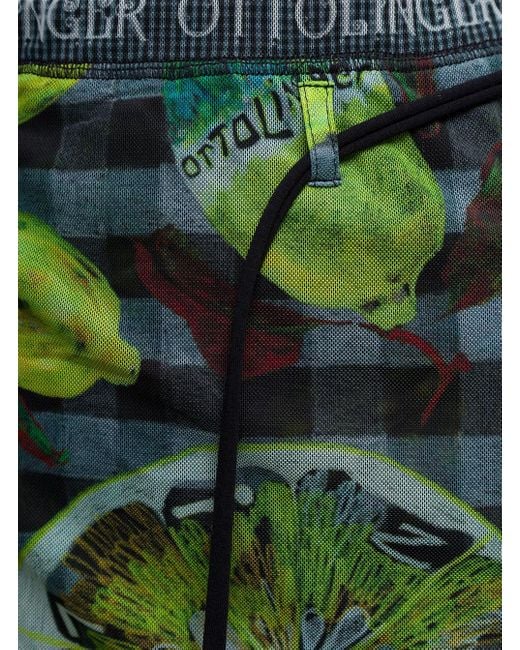 Minigonna a portafoglio con banda logata e stampa limoni in mesh di OTTOLINGER in Green