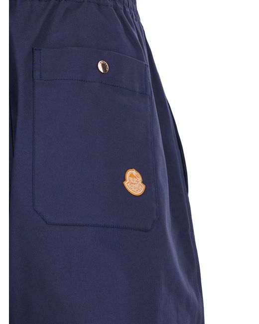 Moncler Blue Pants With Elastic Waist And Logo Patch On The Rear for men