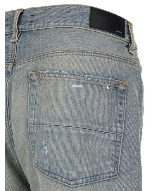 Amiri Blue Light Destroyed Straight Jeans With Cut-Out for men