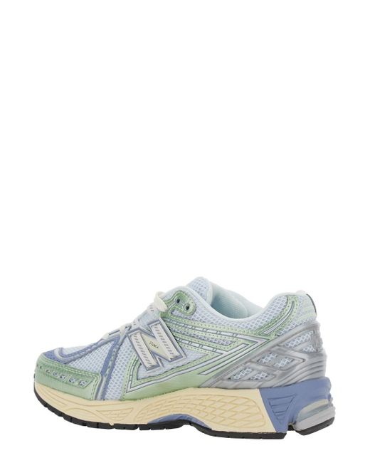 New Balance White Low Top Sneaker With Logo Patch On Tongue And Side And Perforated Panels