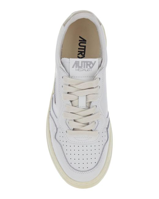 Autry White 'Medalist' Low Top Sneakers With Logo Patch On The Tongue