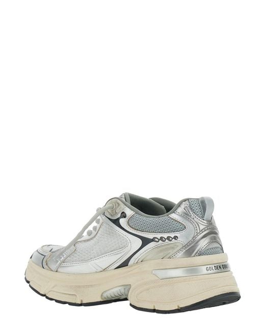 Golden Goose Deluxe Brand White Lightstar Low Top Sneakers With Star Patch On The Side And Logo Tongue