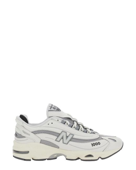 New Balance White Low Top Sneakers With Logo Patch On Side And Tongue And Perforated Panels