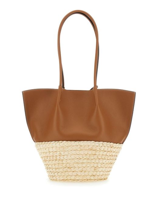 Tod's White 'Bux' Shopper With Logo Imprinted On The Front And Metal Logo Charm