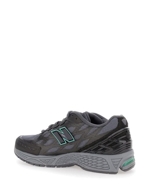 New Balance Gray Sneaker With Mesh Design And Logo