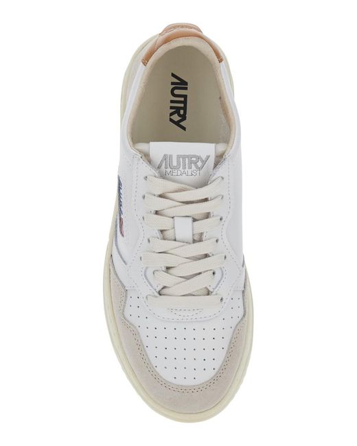 Autry White 'Medalist' Low Top Sneakers With Logo Patch On The Tongue