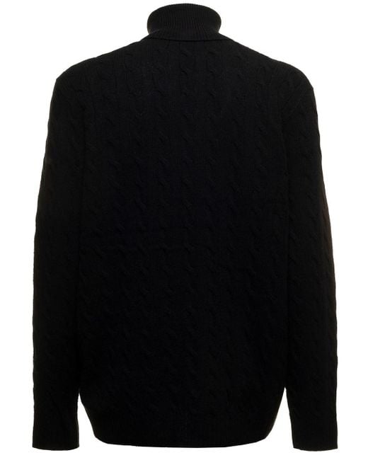 Maglione a collo alto in maglia di lana e cashmere a trecce con ricamo logo  a contrasto sul petto uomo da Uomo di Polo Ralph Lauren in Nero | Lyst