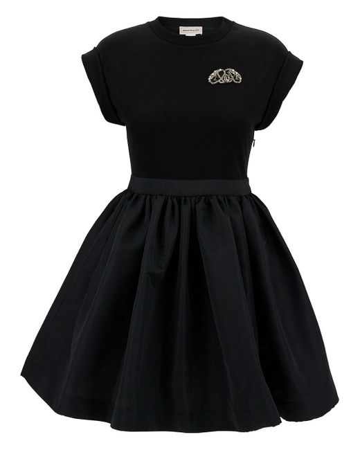 Alexander McQueen Mini Black Dress With Flared Skirt And Embroidered Seal Logo In Cotton