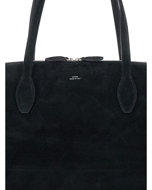 Totême Black Shoulder Bag With Embossed Logo Lettering On The Front In