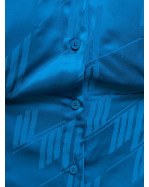 Mini abito camicia 'sylvie' con monogramma all-over in tessuto satinato mini di The Attico in Blue