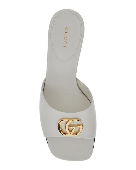 Gucci White Sandals With Gg Logo Plaque On The Front