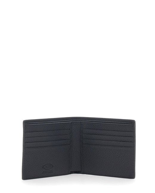 Tod's Black Bifold Wallet With Metal T Logo Plate On The Front for men